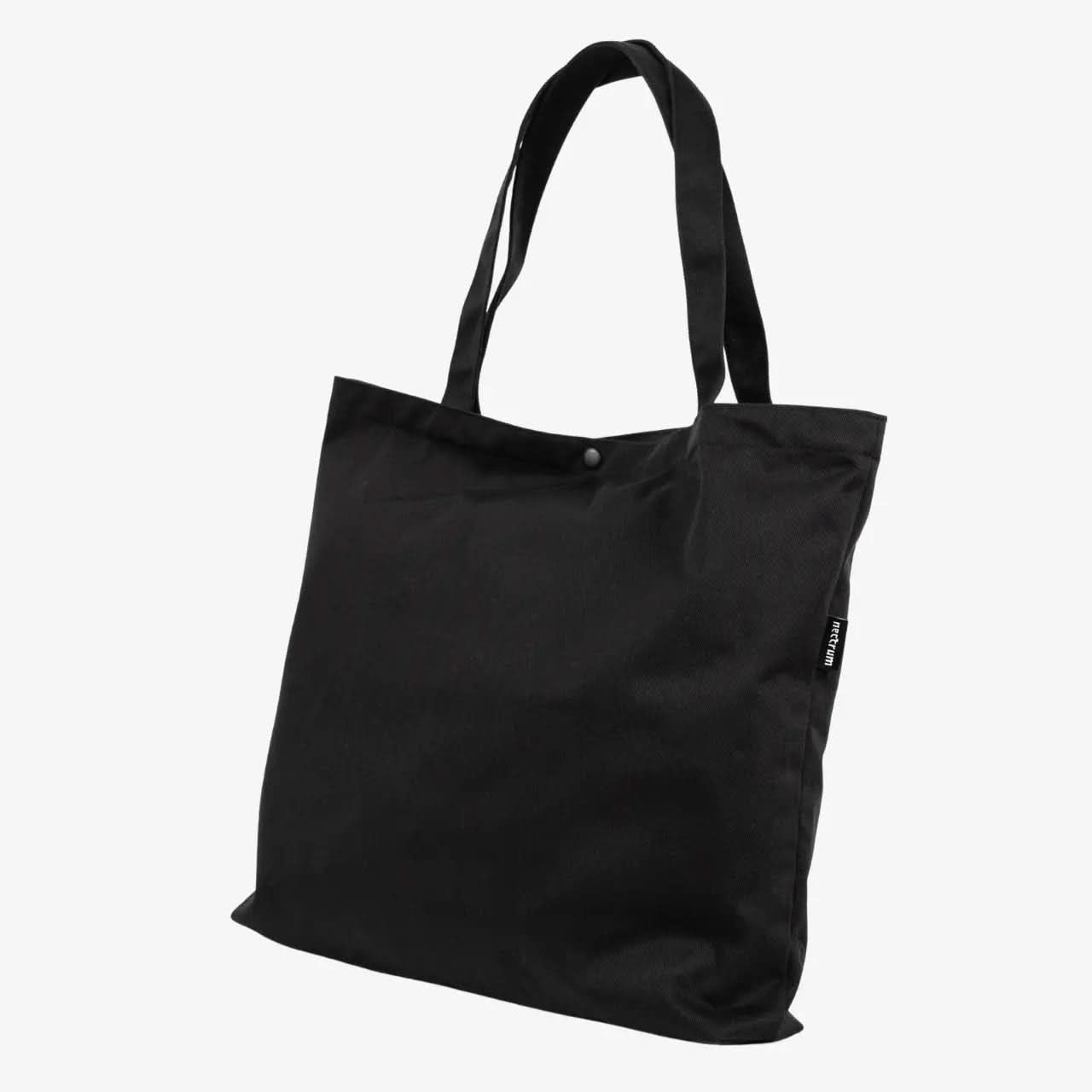 45° angle of Nectrum recycled plastic bottle tote, showing reinforced seams and textured RPET fabric