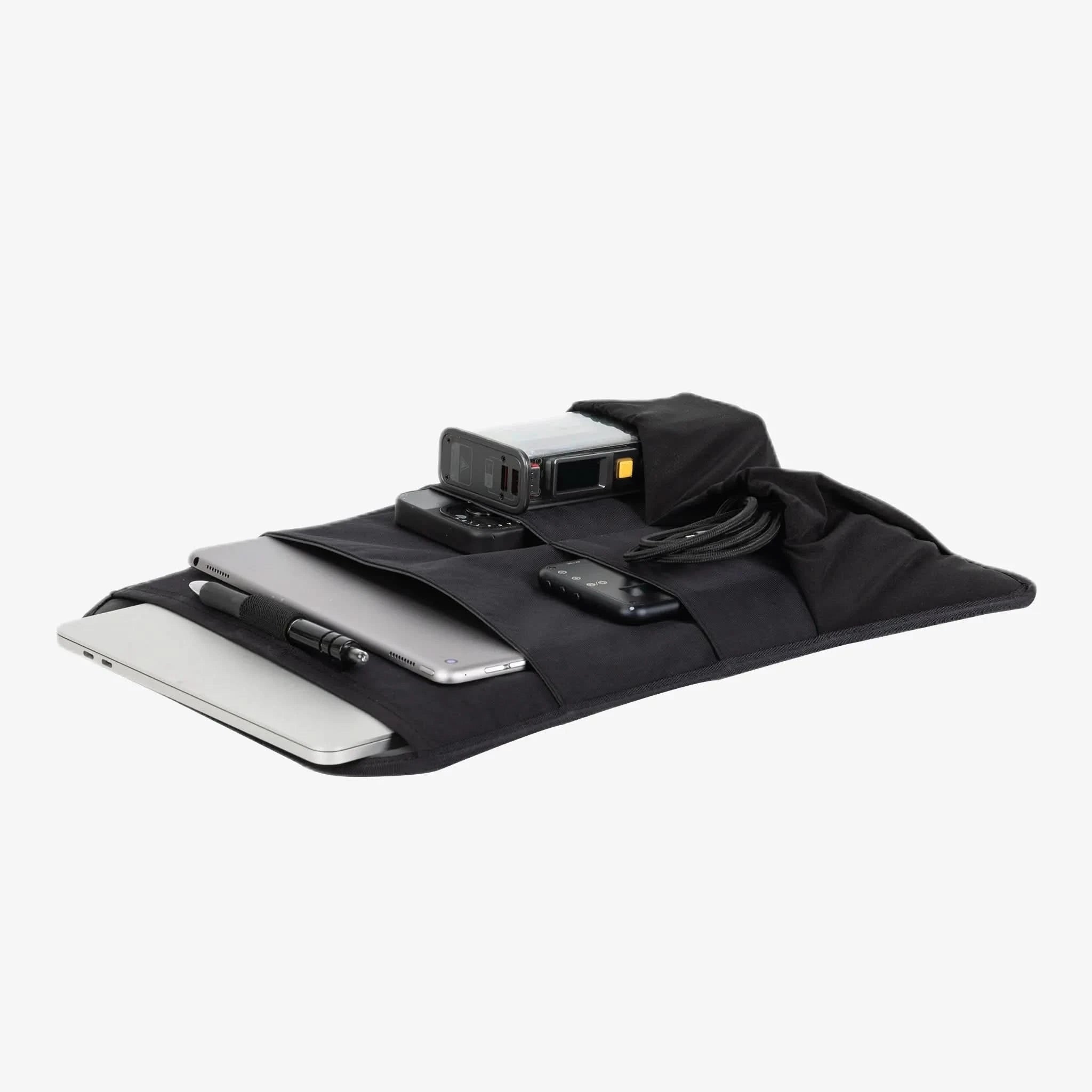 Nectrum laptop sleeve laid flat on floor: scratch-resistant rubberized base, anti-slip texture